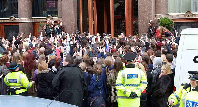Fans outside Bieber's hotel in Liverpool Fans outside Bieber's hotel in Liverpool