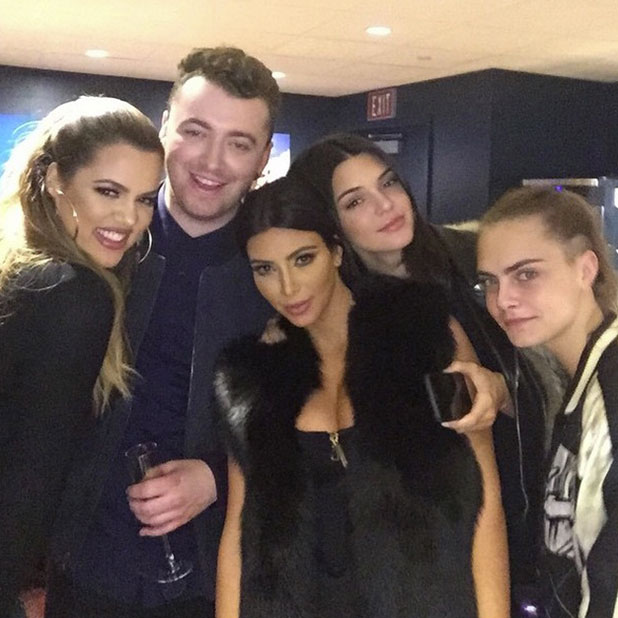 Kim, Khloe, Kendall and Cara with Sam Smith.