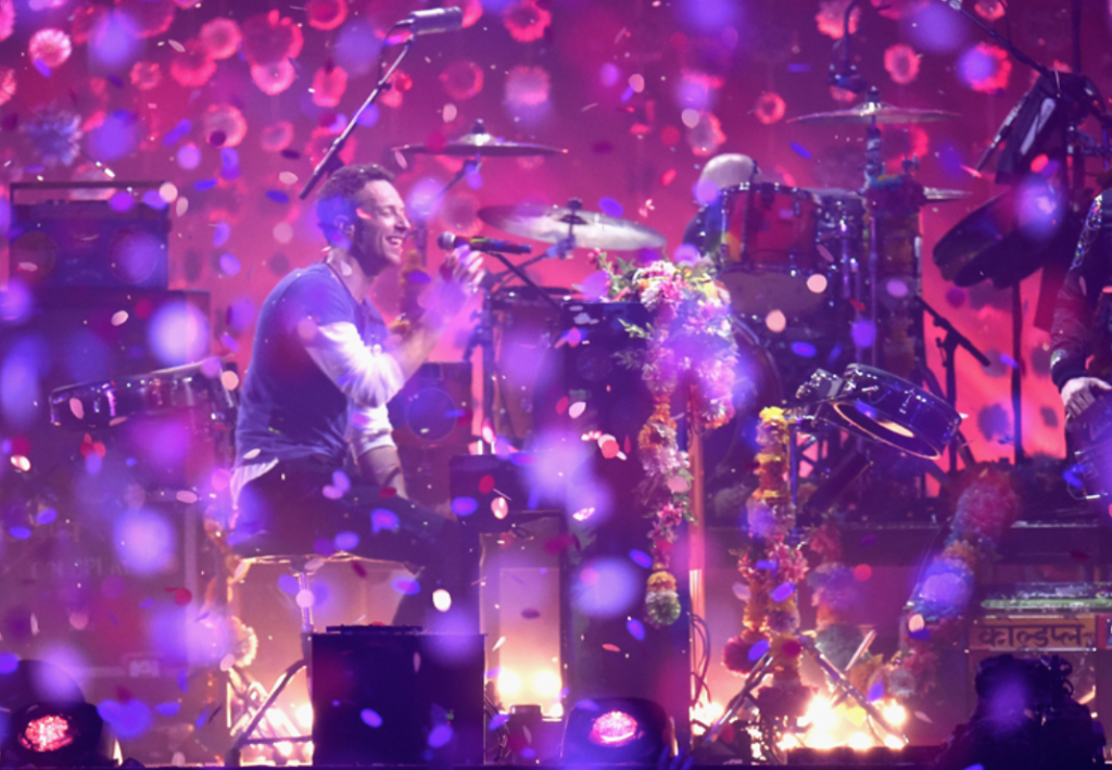 The ceremony was opened by Coldplay, who gave a colourful, floral performance of their single Hymn For The Weekend, showering the audience with confetti petals as they played on one of two separate stages at London's O2 arena.