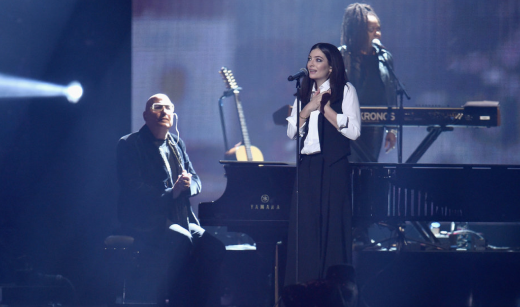 Lorde took the stage for a surprise tribute to David Bowie. Joined by Bowie’s own backing band, she sang a rousing rendition of “Life on Mars” - which people are saying was a much more refined tribute than Lady Gaga's back at the Grammy's